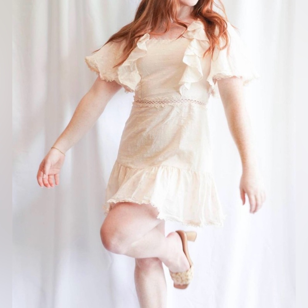 MABLE Swiss Dot Ruffle Mini Dress in Beige. - L